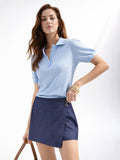 Polo azzurra in maglia a costine