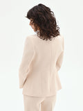 Giacca doppiopetto asimmetrica beige chiaro