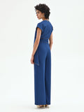 Tuta blu brillante con cintura annodata