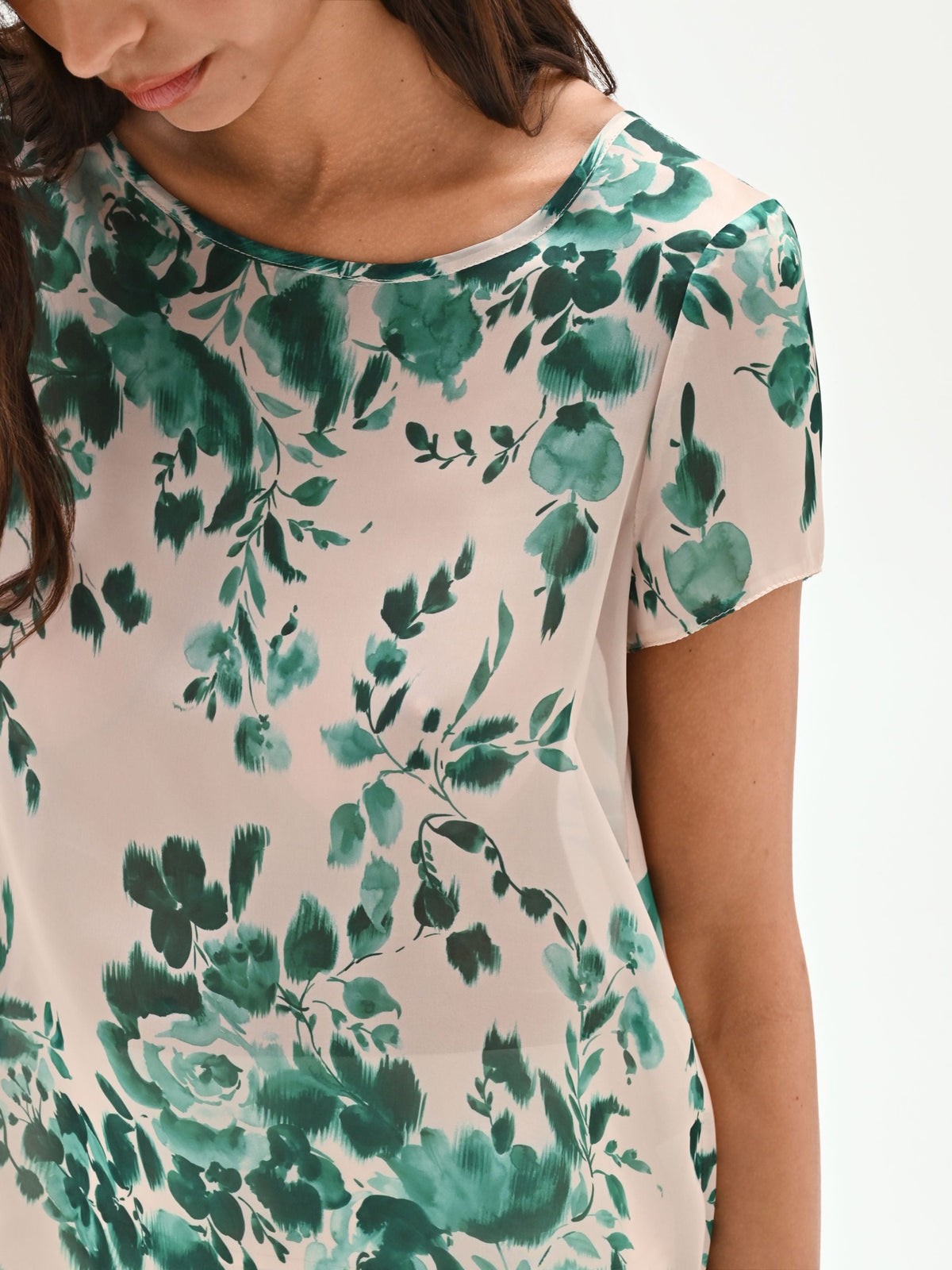 Blusa verde con stampa floreale all-over