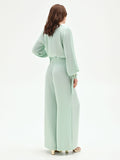 Pantalone palazzo verde menta con spacco frontale