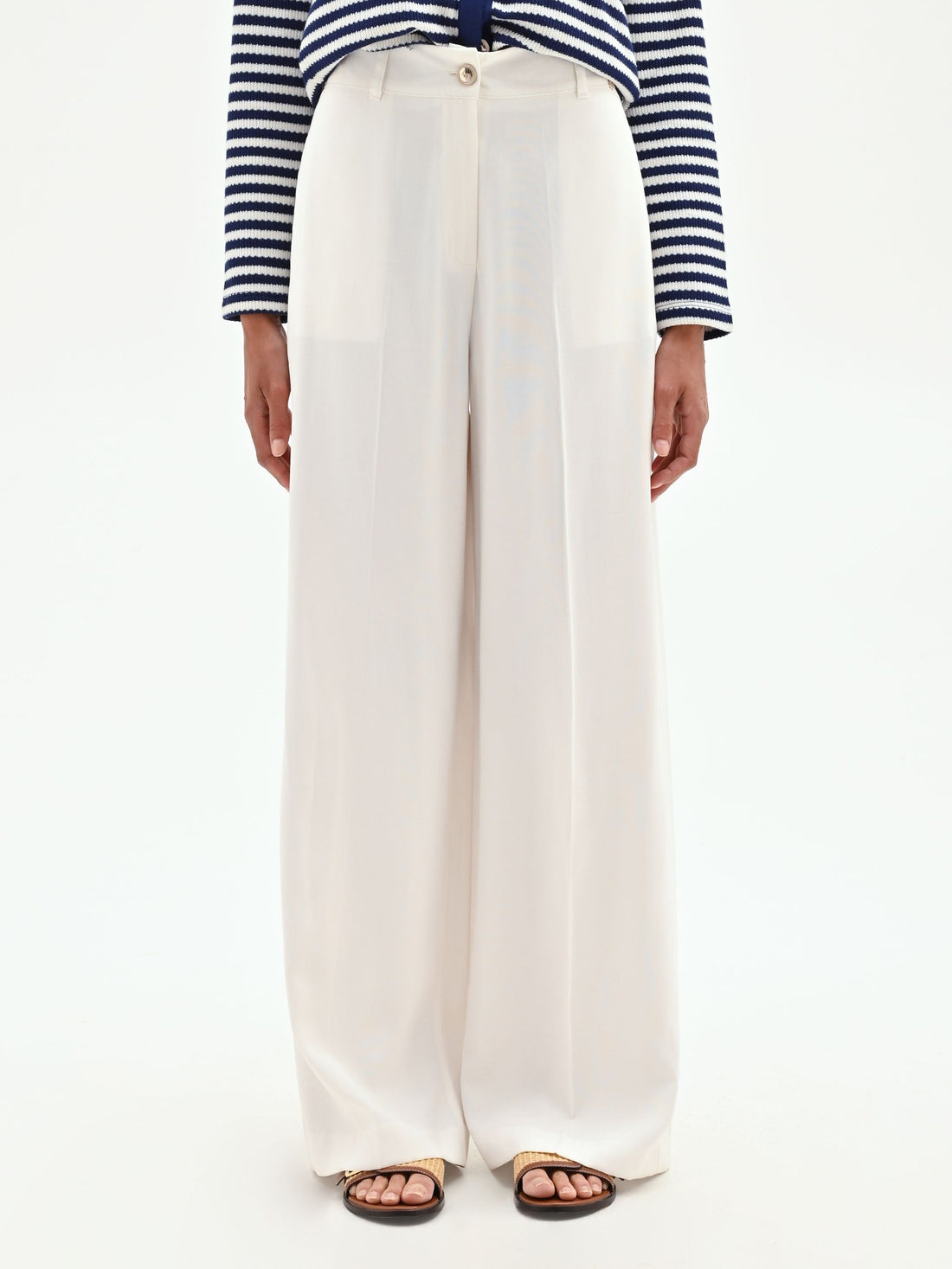 Pantalone a palazzo panna bianco con piega centrale