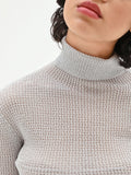 Maglia argento con texture a nido d'ape