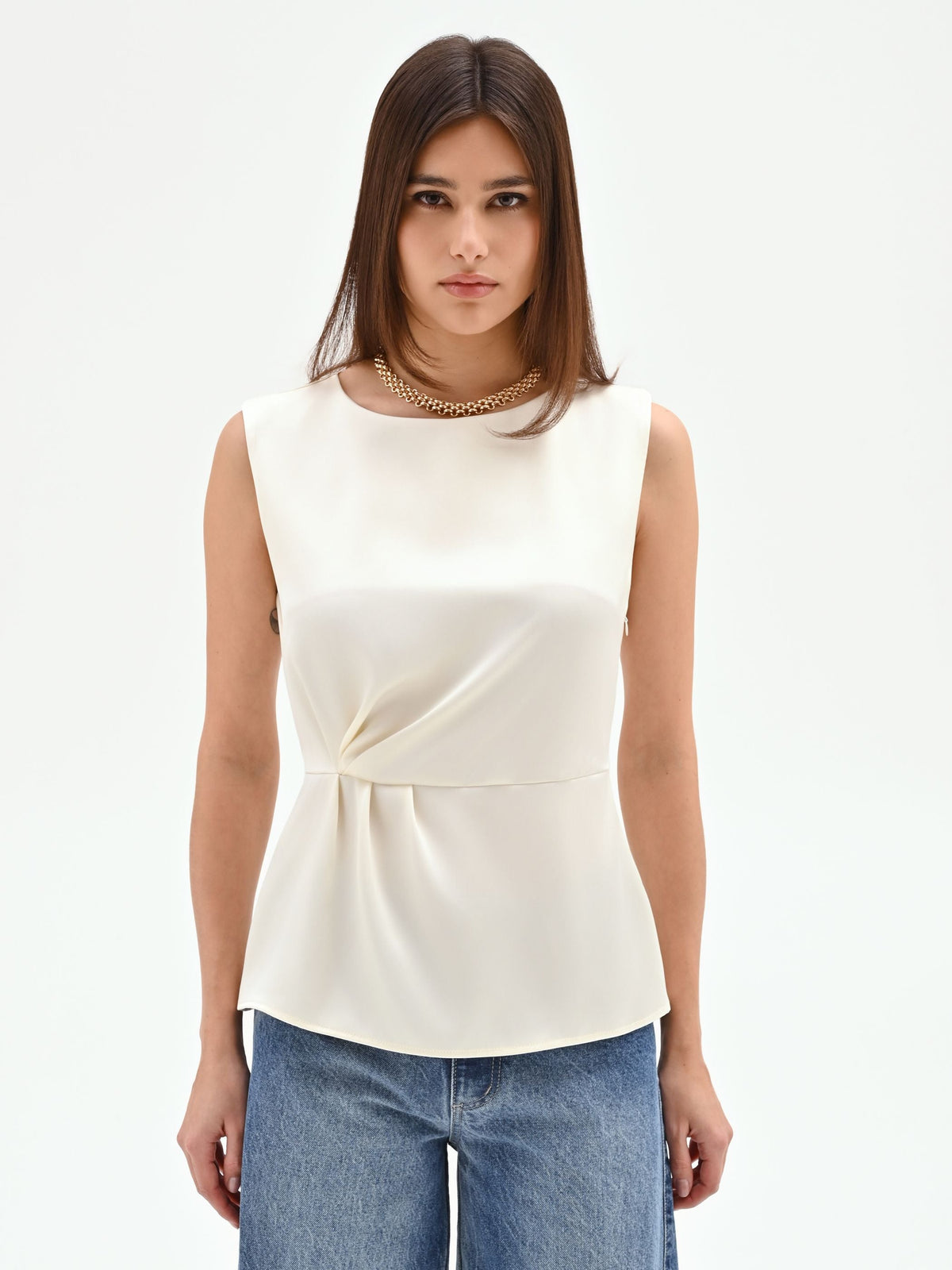 Blusa bianco panna con drappeggio laterale