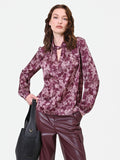 Blusa rosso bordeaux con fantasia e collo a torchon