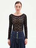 Blusa nera in pizzo floreale