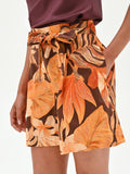 Pantaloncino arancione a fantasia tropicale
