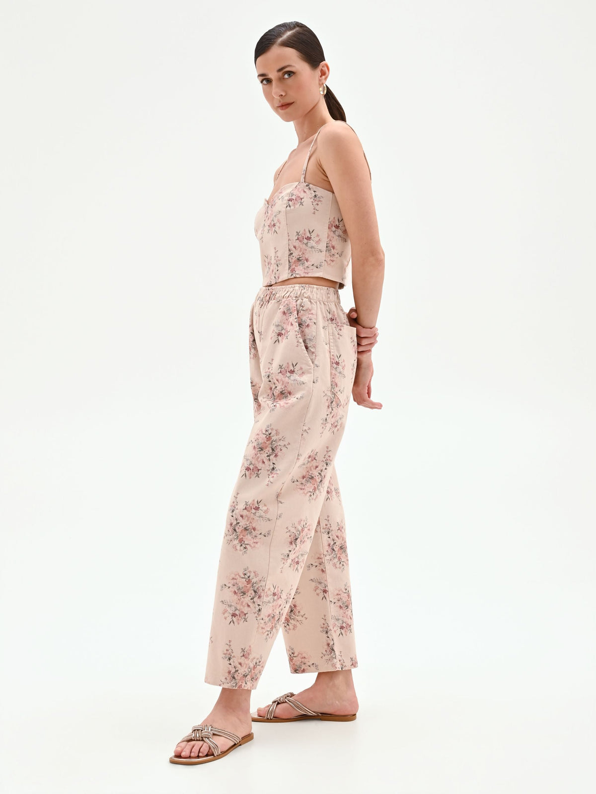 Pantalone rosa in denim stampa floreale