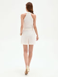 Tuta corta bianca in cotone con scollo halter