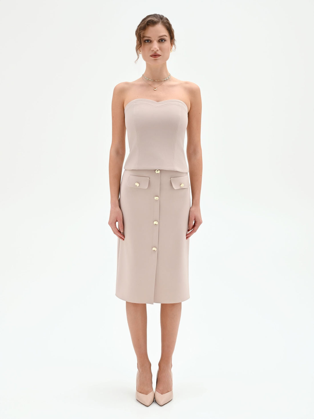 Top Studio beige a cuore con impunture