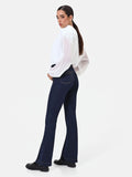 Jeans flare blu navy con bottoni dorati