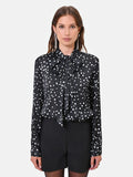 Blusa nera a pois con nastro lavallière