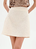 Minigonna beige chiaro a vita alta