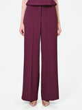 Pantalone a palazzo bordeaux dalla linea fluida