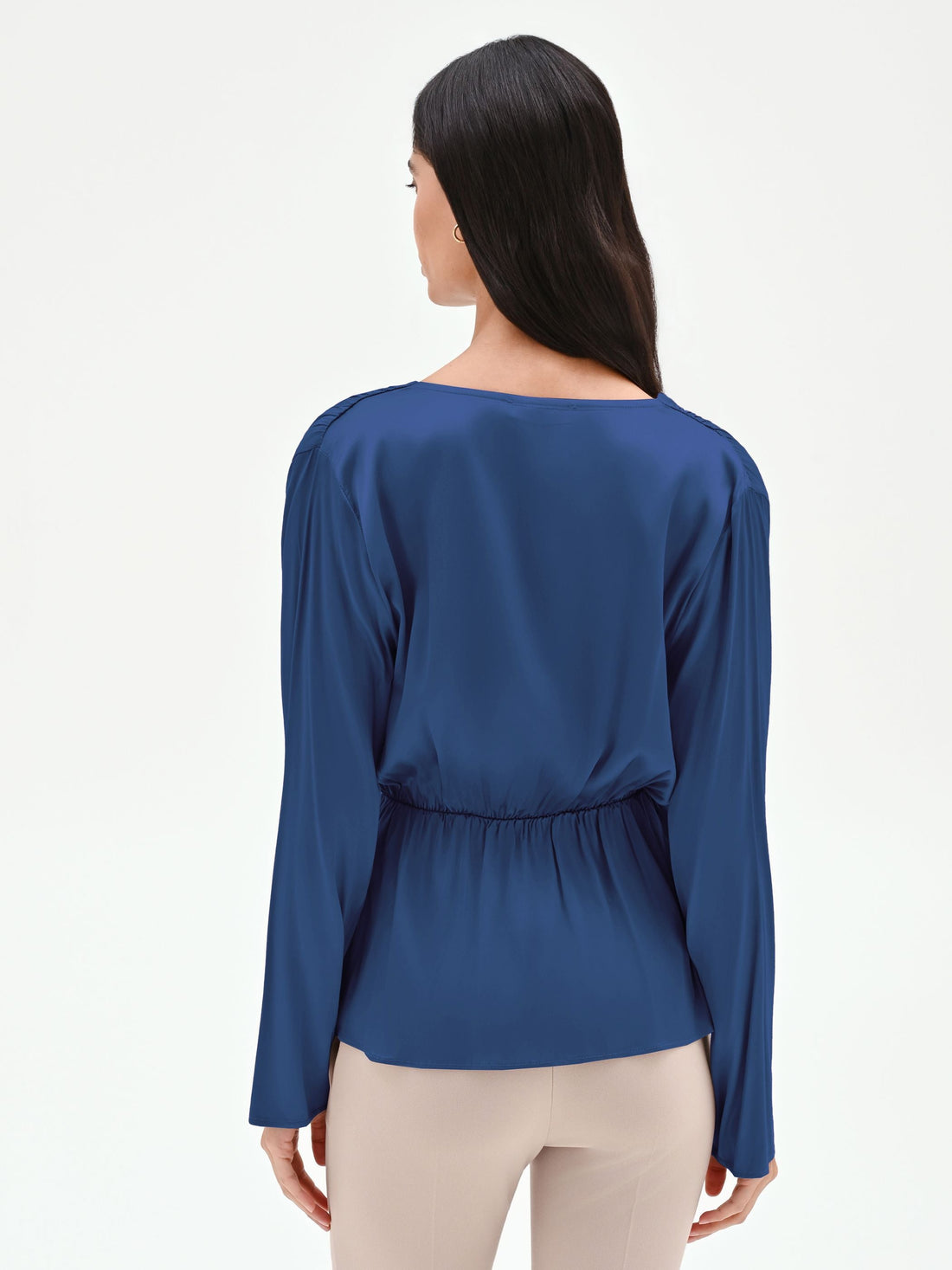 Blusa blu brillante con drappeggio