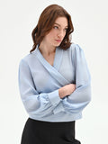 Blusa cielo azzurro con incrocio a portafoglio