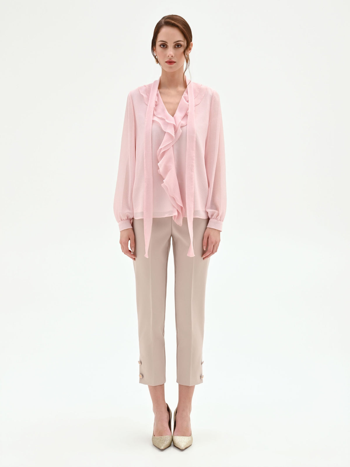 Blusa rosa chiaro con rouche e nastro lavalliere
