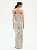 Pantalone in lino panna a palazzo con fantasia a righe