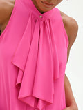 Top fuxia in georgette con rouche a cascata