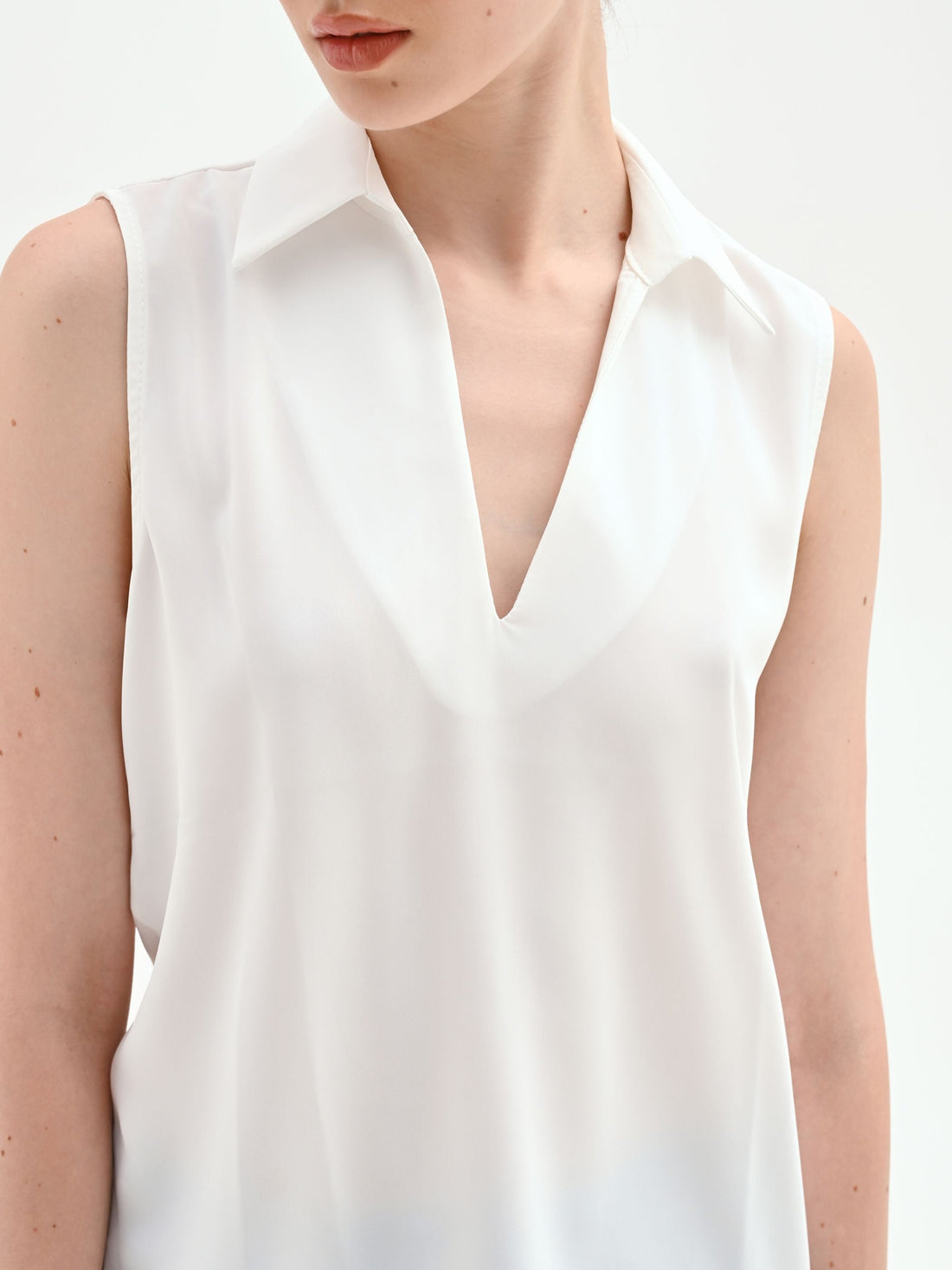 Blusa smanicata bianco panna