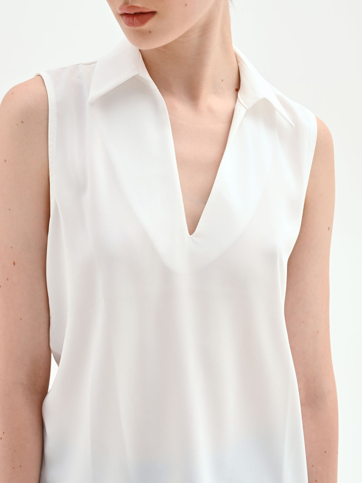 Blusa smanicata bianco panna