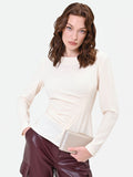 Blusa bianca con drappeggio asimmetrico