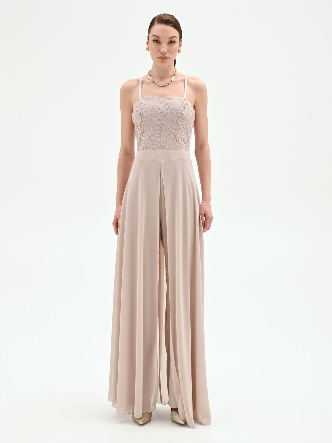 Tuta con corpetto in pizzo e pantaloni palazzo tortora beige