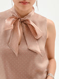 Top marrone bronzo con fiocco e punti luce