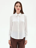 Camicia bianca con bottoni ricoperti
