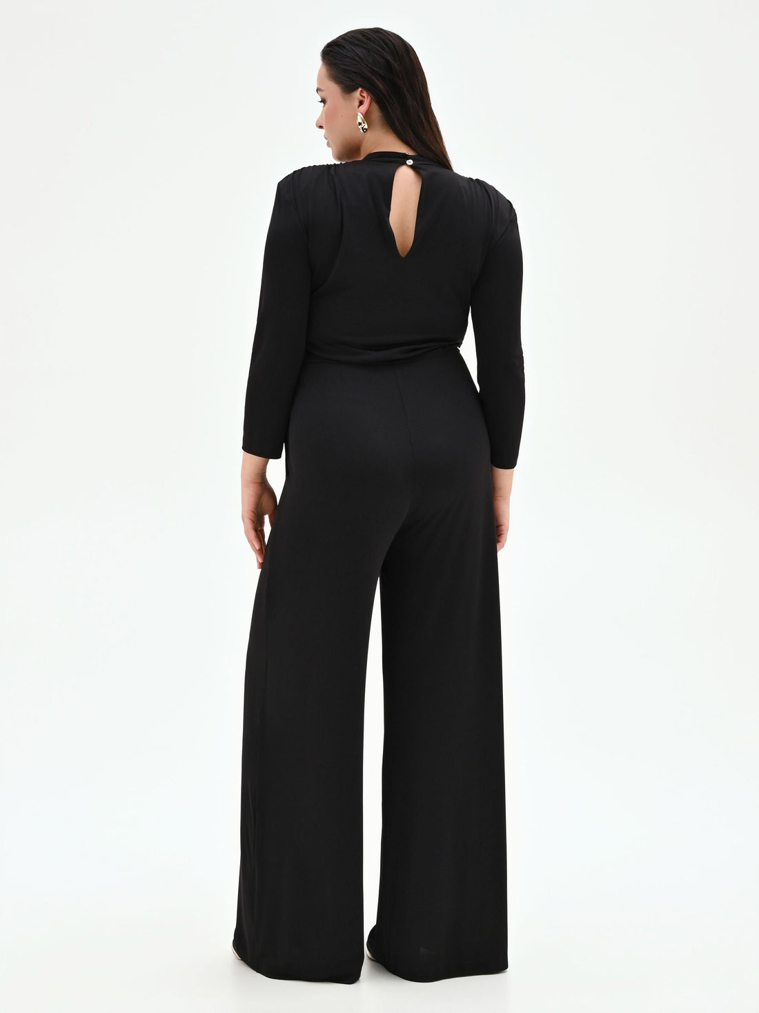 Tuta nera Curvy palazzo in jersey fluido