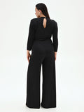 Tuta nera Curvy palazzo in jersey fluido