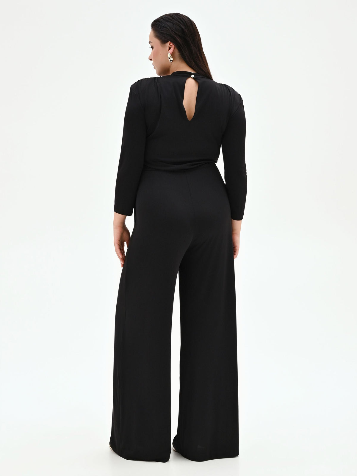 Tuta nera Curvy palazzo in jersey fluido