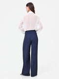 Pantalone a palazzo blu navy dalla linea fluida