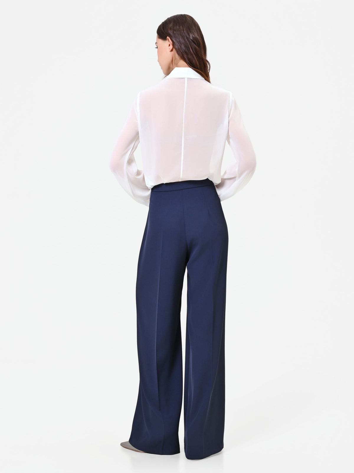 Pantalone a palazzo blu navy dalla linea fluida