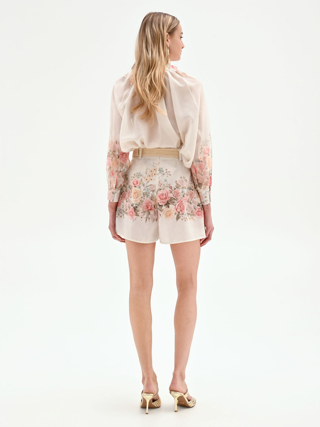 Pantalone shorts bianco a fantasia floreale