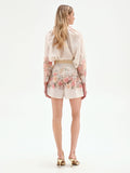Pantalone shorts bianco a fantasia floreale