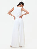 Pantalone palazzo bianco con bottone design