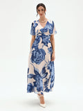 Abito lungo blu brillante con fantasia floreale