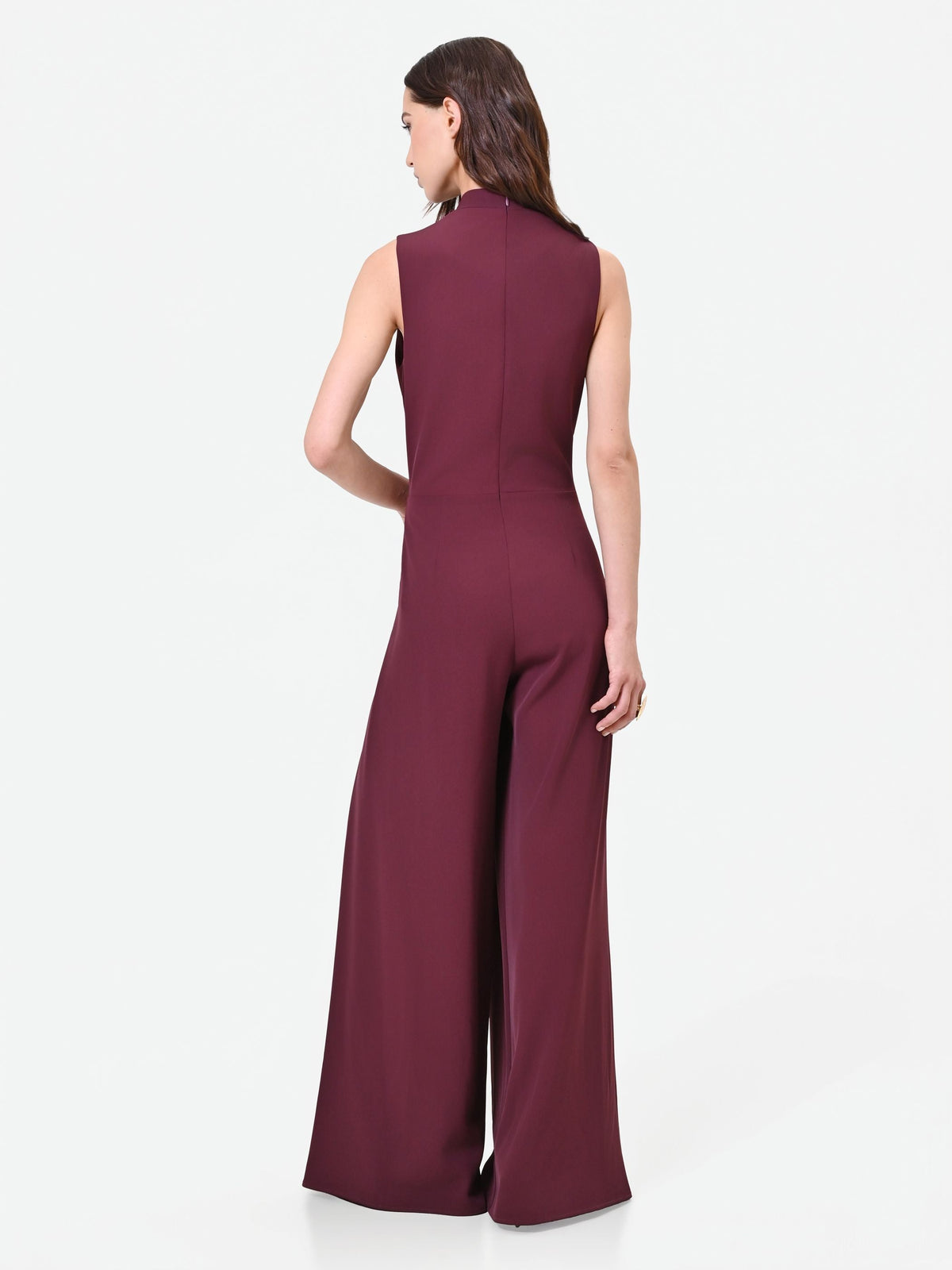 Tuta bordeaux fluida con bottone design
