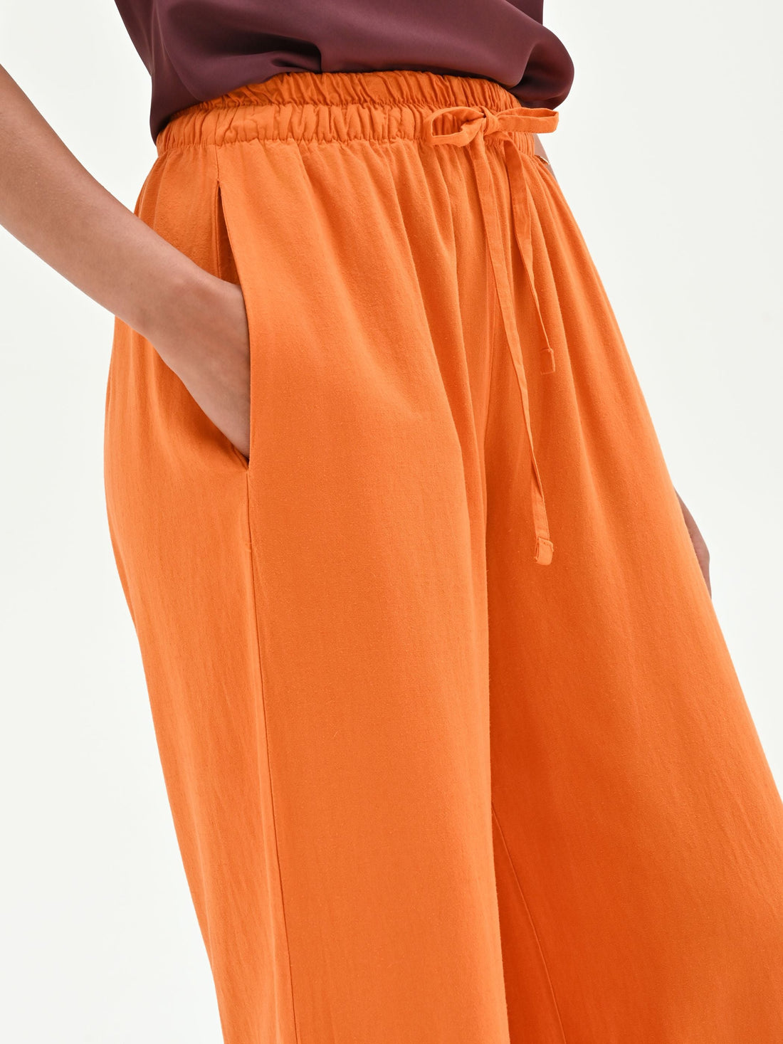 Pantalone a palazzo arancione in lino