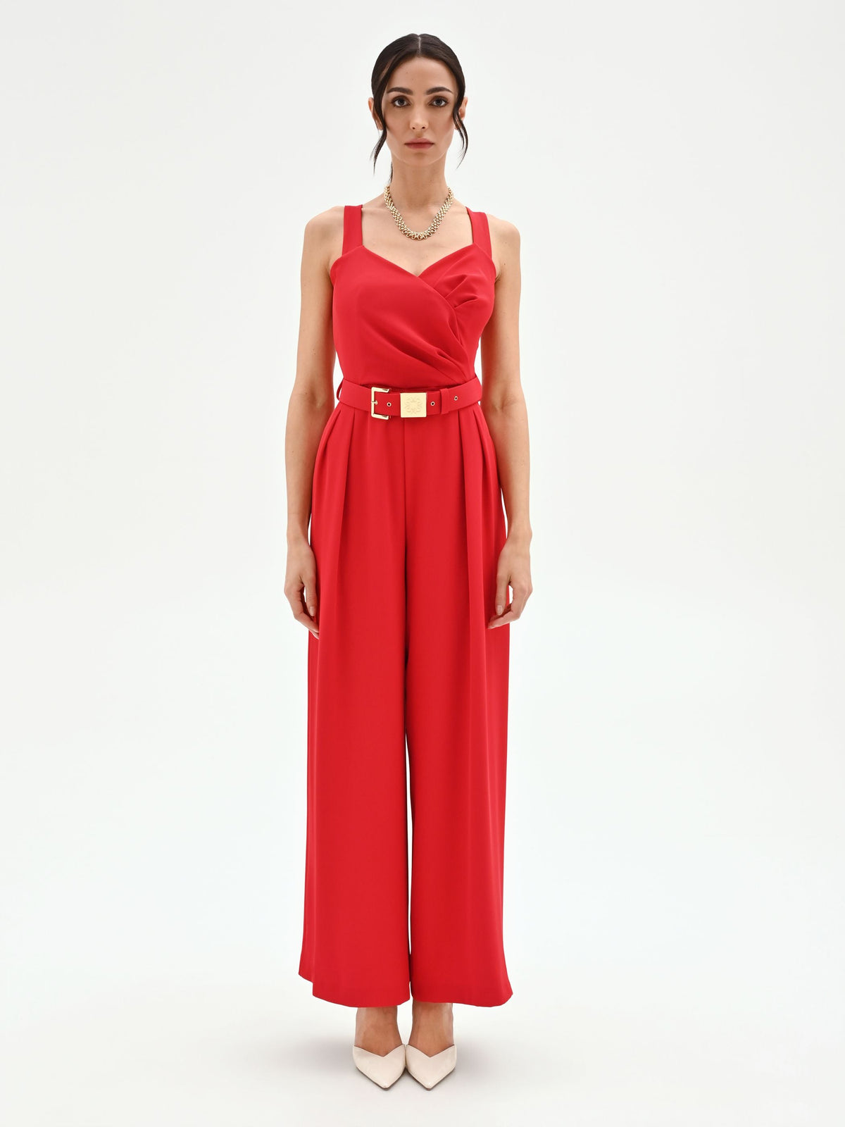 Tuta rossa con pantaloni palazzo e cintura in cadi
