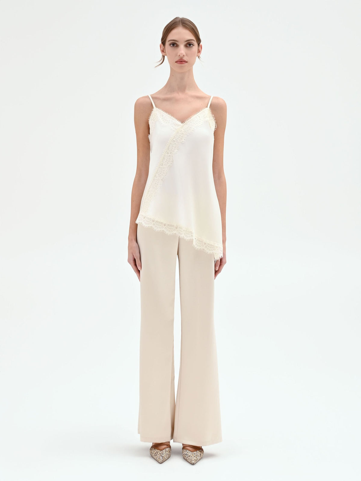Top in raso panna con pizzo