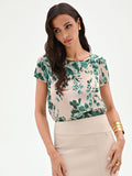 Blusa verde con stampa floreale all-over