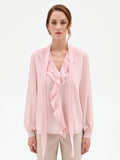 Blusa rosa chiaro con rouche e nastro lavalliere