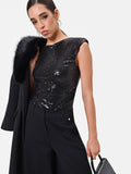Top smanicato nero in paillettes
