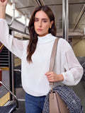 Blusa panna a maniche lunghe con plissettatura