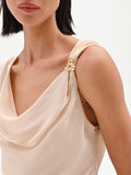Top beige chiaro drappeggiato in tessuto cangiante