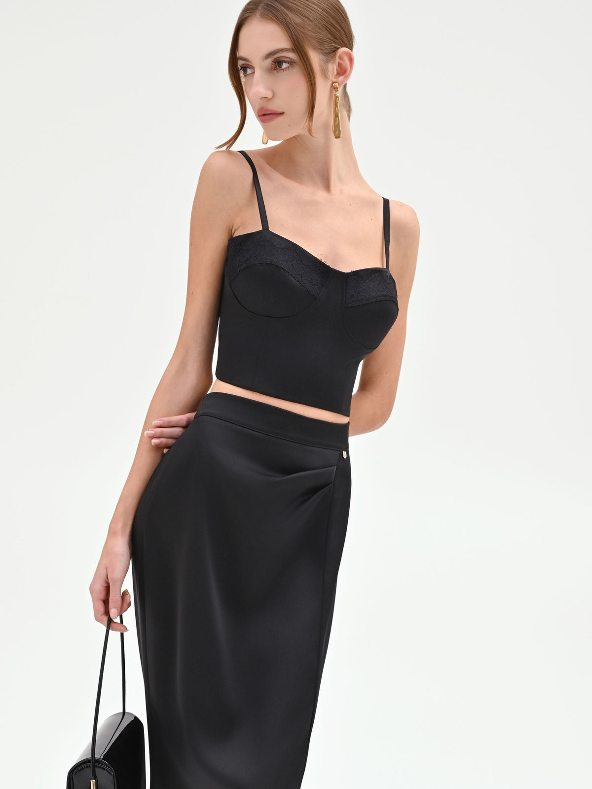 Top bustier nero con profili in pizzo
