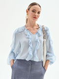 Blusa azzurro cielo con rouches