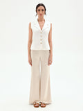 Gilet panna con bottoni design oro
